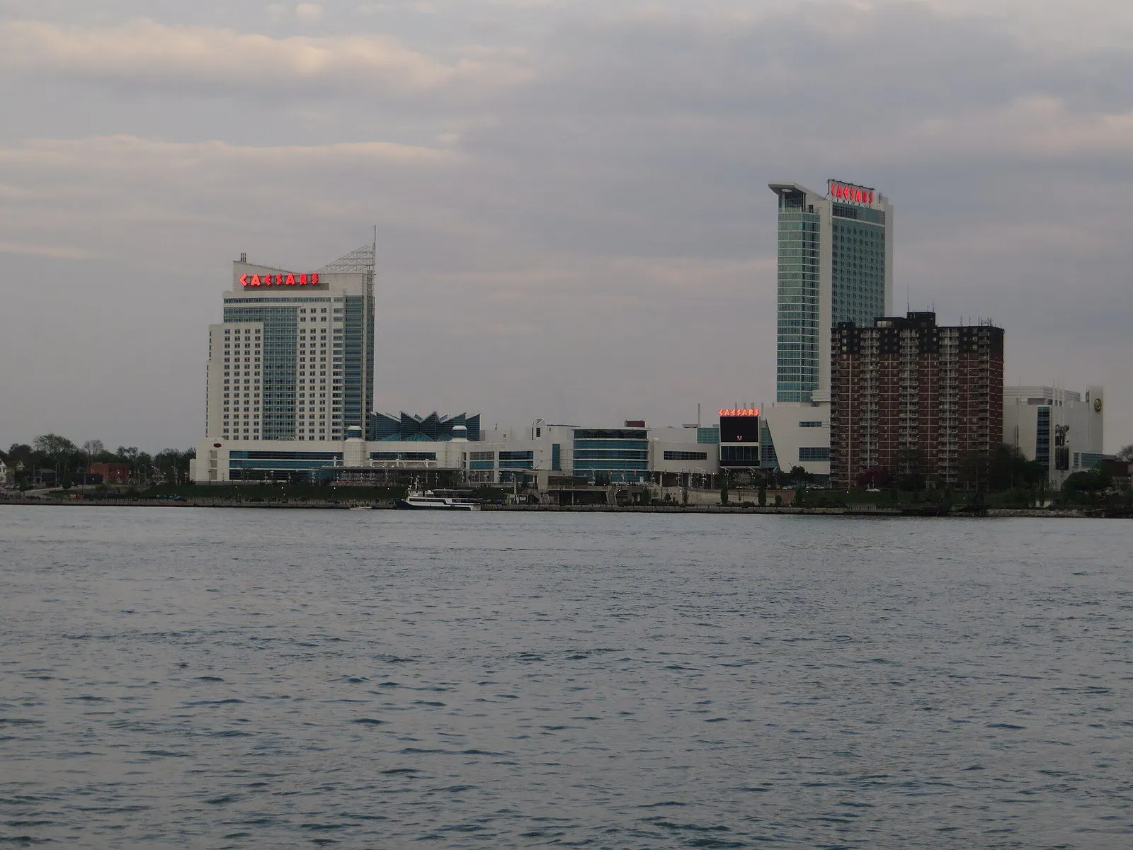 Caesars Windsor on the Windsor riverfront, seen across the Detroit River at dusk — Caesars Windsor