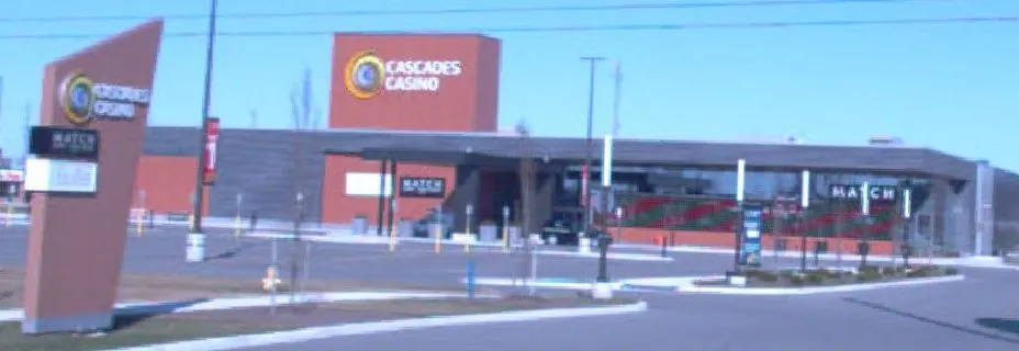 Cascades Casino Chatham and its roadside sign seen from the street — Cascades Casino Chatham