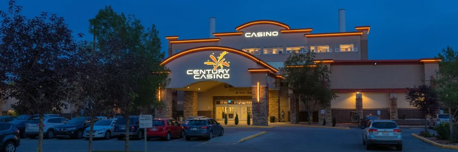 The entrance of Century Casino Edmonton at dusk — Century Casino & Hotel Edmonton