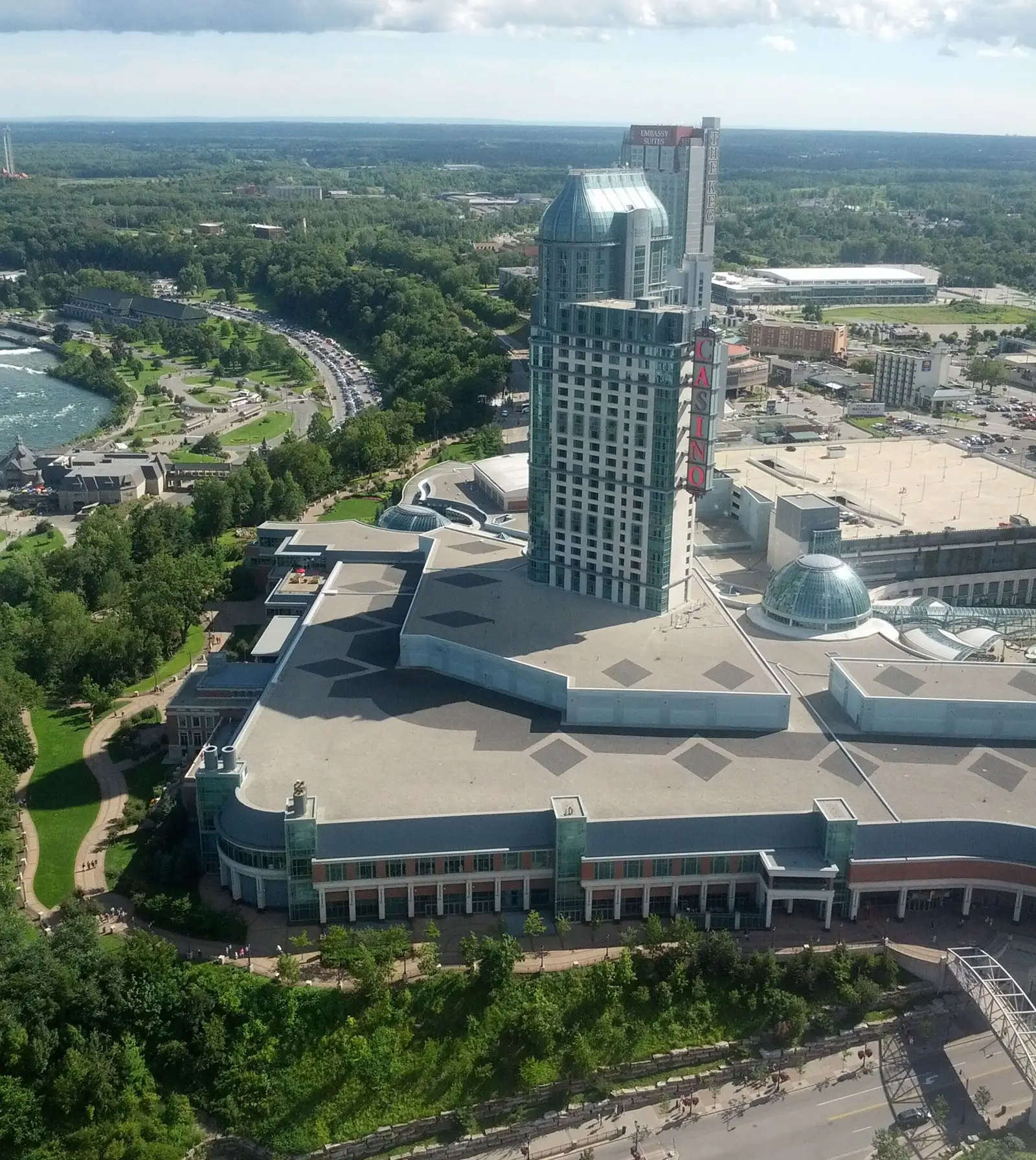 Elevated summer view of the Fallsview Casino Resort complex, with the Niagara River at left — Fallsview Casino Resort