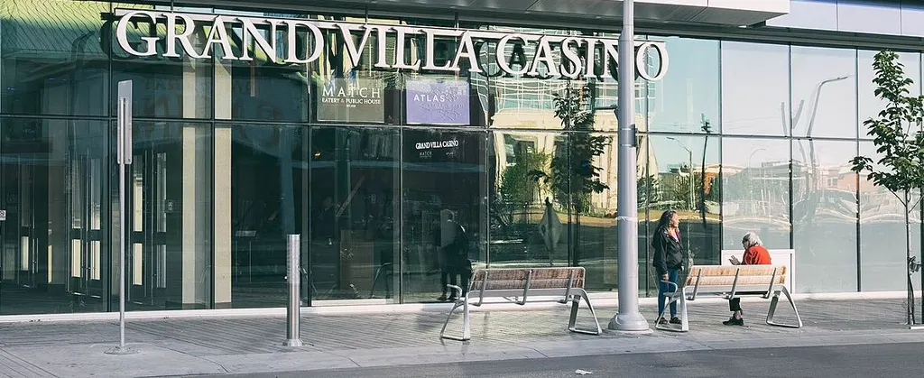 The glass entrance of Grand Villa Casino in Edmonton's Ice District — Grand Villa Casino Edmonton