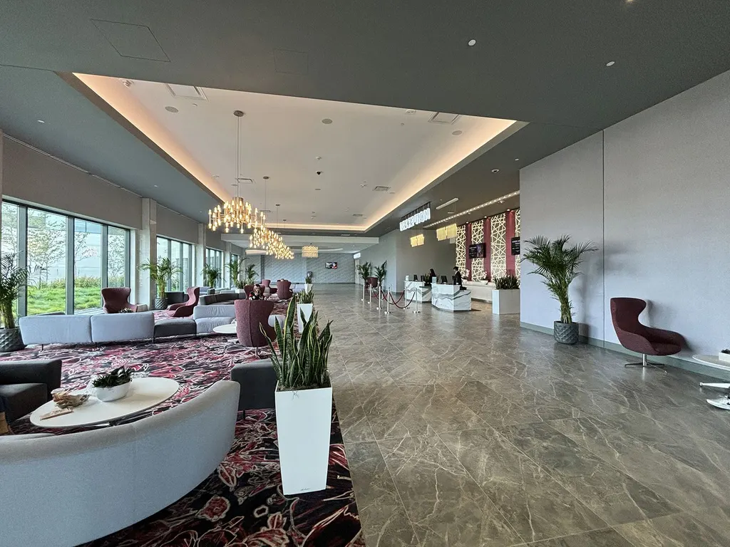 The hotel lobby, with lounge seating and the reception desk — Great Canadian Casino Resort Toronto