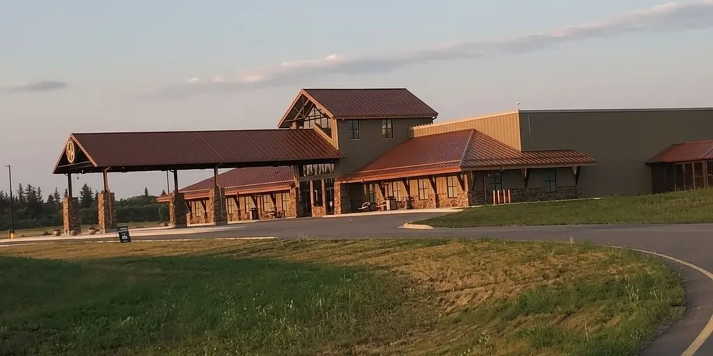 Sand Hills Casino and its entrance canopy at dusk — Sand Hills Casino
